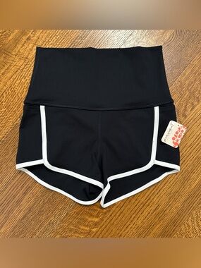 FP Movement High-Waist Black Athletic Shorts with White Trim. Size small. NWT.